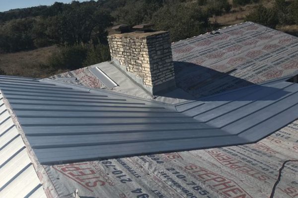 The Installation of a Metal Roof Being Completed by Stephens Roofing & Remodeling